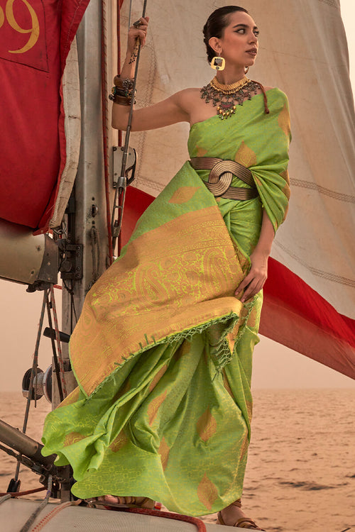 Load image into Gallery viewer, Murmurous Green Soft Banarasi Silk Saree With Diaphanous Blouse Piece
