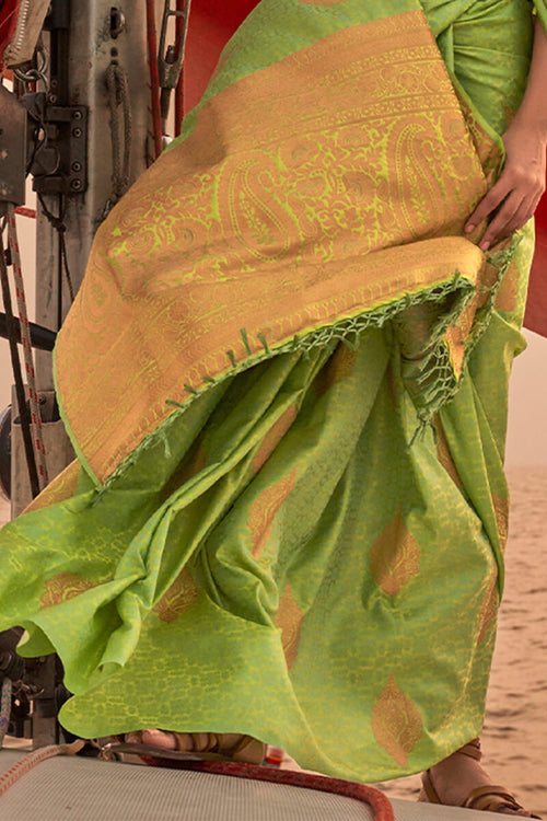 Load image into Gallery viewer, Murmurous Green Soft Banarasi Silk Saree With Diaphanous Blouse Piece
