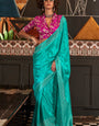 Deserving Turquoise Soft Banarasi Silk Saree With Glowing Blouse Piece