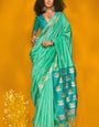 Assemblage Turquoise  Soft Banarasi Silk Saree With Epiphany Blouse Piece