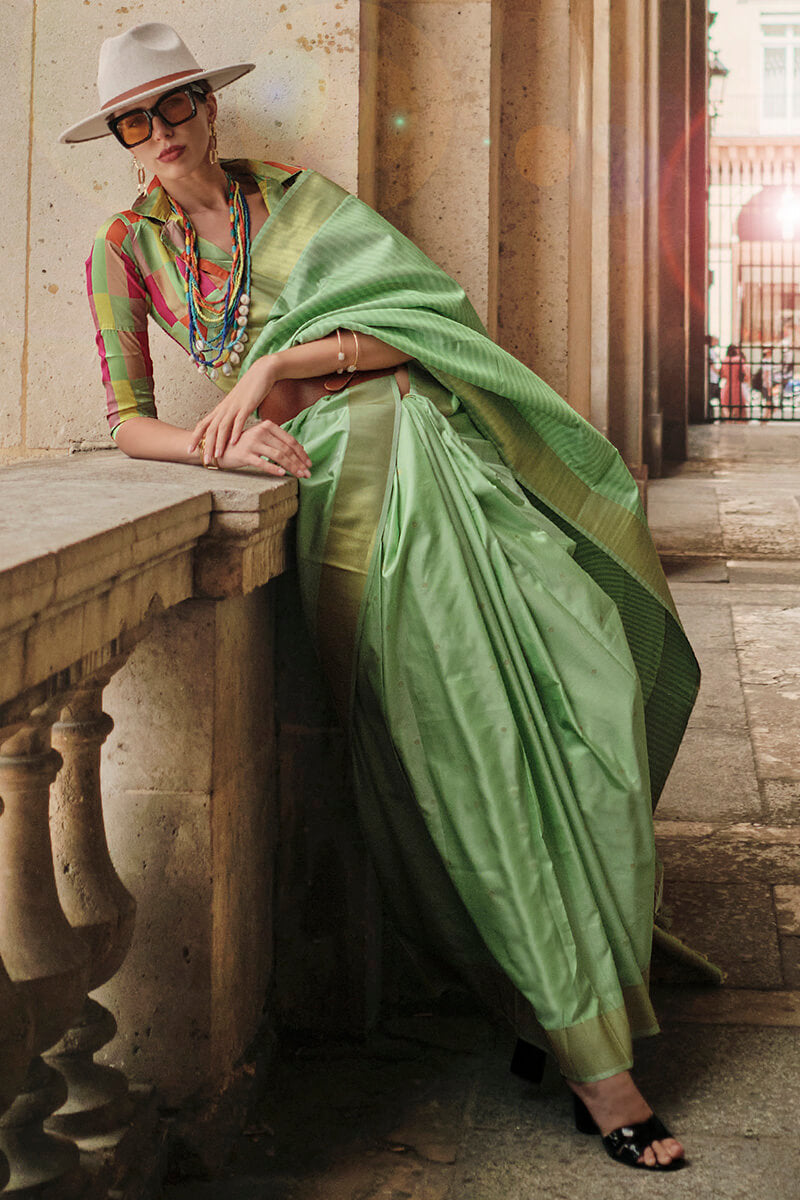 Opulent Pista Soft Banarasi Silk Saree With Fancifull Blouse Piece