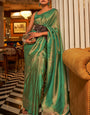 Flattering Green Kanjivaram Silk Saree With Precious Blouse Piece