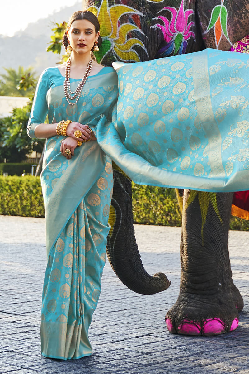 Arresting Firozi Kanjivaram Silk Saree With Flamboyant Blouse Piece