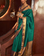 Panoply Dark Green Soft Banarasi Silk Saree With Confounding Blouse Piece