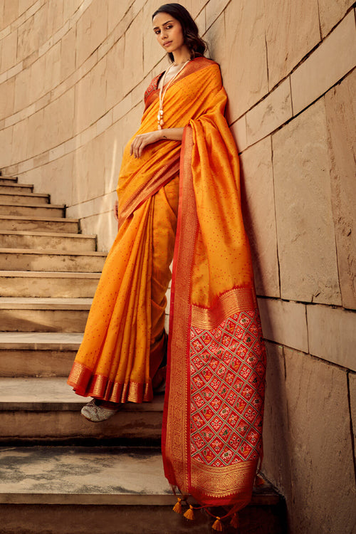 Load image into Gallery viewer, Staggering Orange Patola Silk Saree with Redolent Blouse Piece
