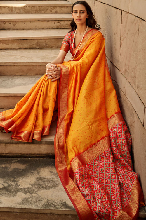 Load image into Gallery viewer, Staggering Orange Patola Silk Saree with Redolent Blouse Piece
