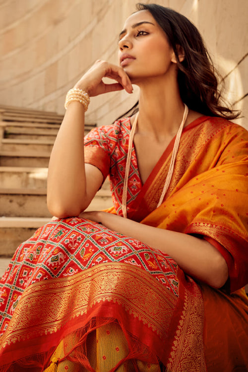 Load image into Gallery viewer, Staggering Orange Patola Silk Saree with Redolent Blouse Piece
