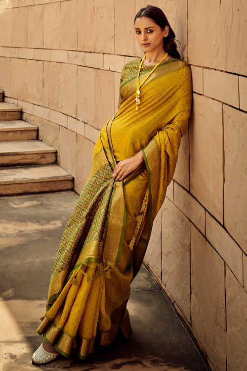 Load image into Gallery viewer, Twirling Mustard Patola Silk Saree with Glorious Blouse Piece
