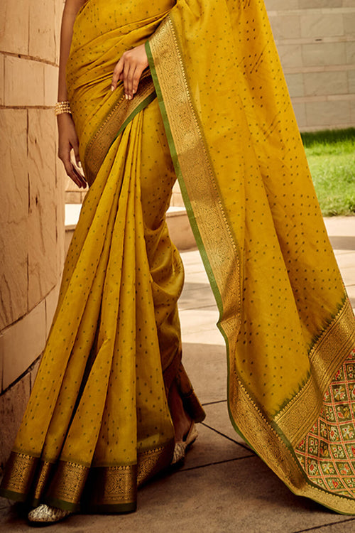 Load image into Gallery viewer, Twirling Mustard Patola Silk Saree with Glorious Blouse Piece
