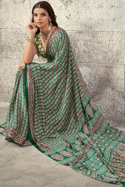 Prominent Green Ajrakh Printed Satin Silk Saree With Prettiest Blouse Piece