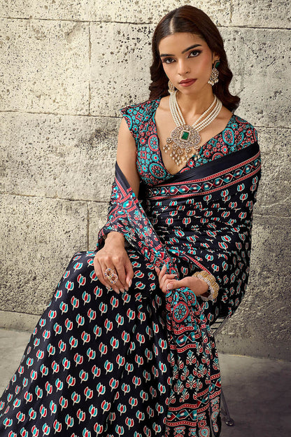 Refreshing Black Ajrakh Printed Satin Silk Saree With Serendipity Blouse Piece