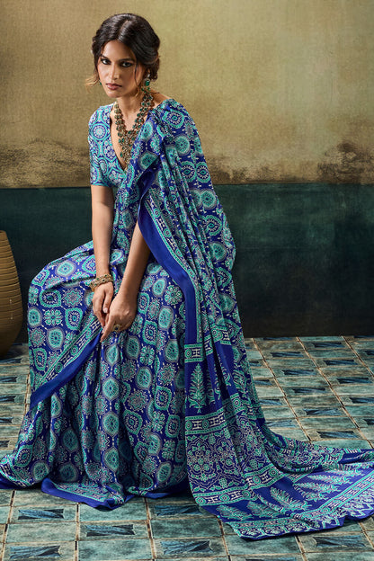 Cynosure Blue Ajrakh Printed Satin Silk Saree With Embrocation Blouse Piece