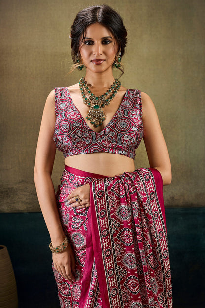 Mellifluous Dark Pink Ajrakh Printed Satin Silk Saree With Serendipity Blouse Piece