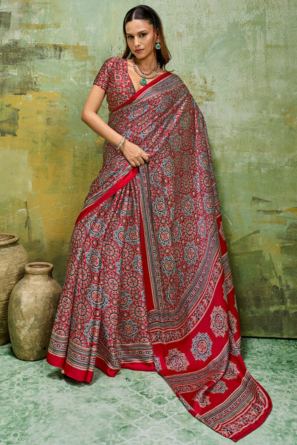 Staggering Red Ajrakh Printed Satin Silk Saree With Splendorous Blouse Piece