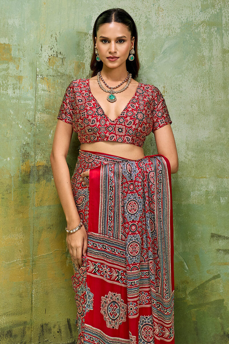 Staggering Red Ajrakh Printed Satin Silk Saree With Splendorous Blouse Piece