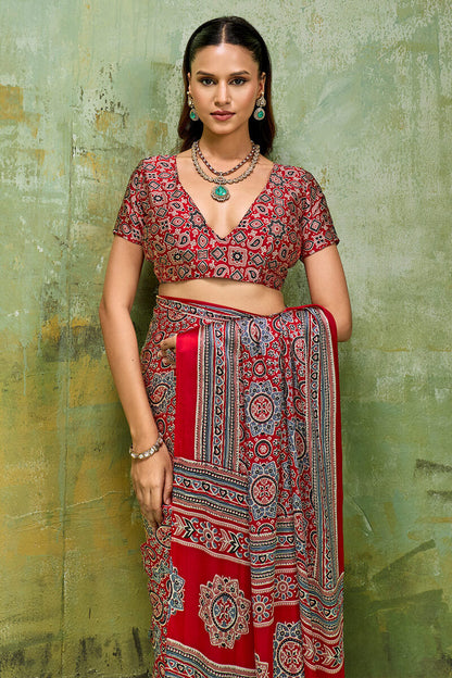 Staggering Red Ajrakh Printed Satin Silk Saree With Splendorous Blouse Piece