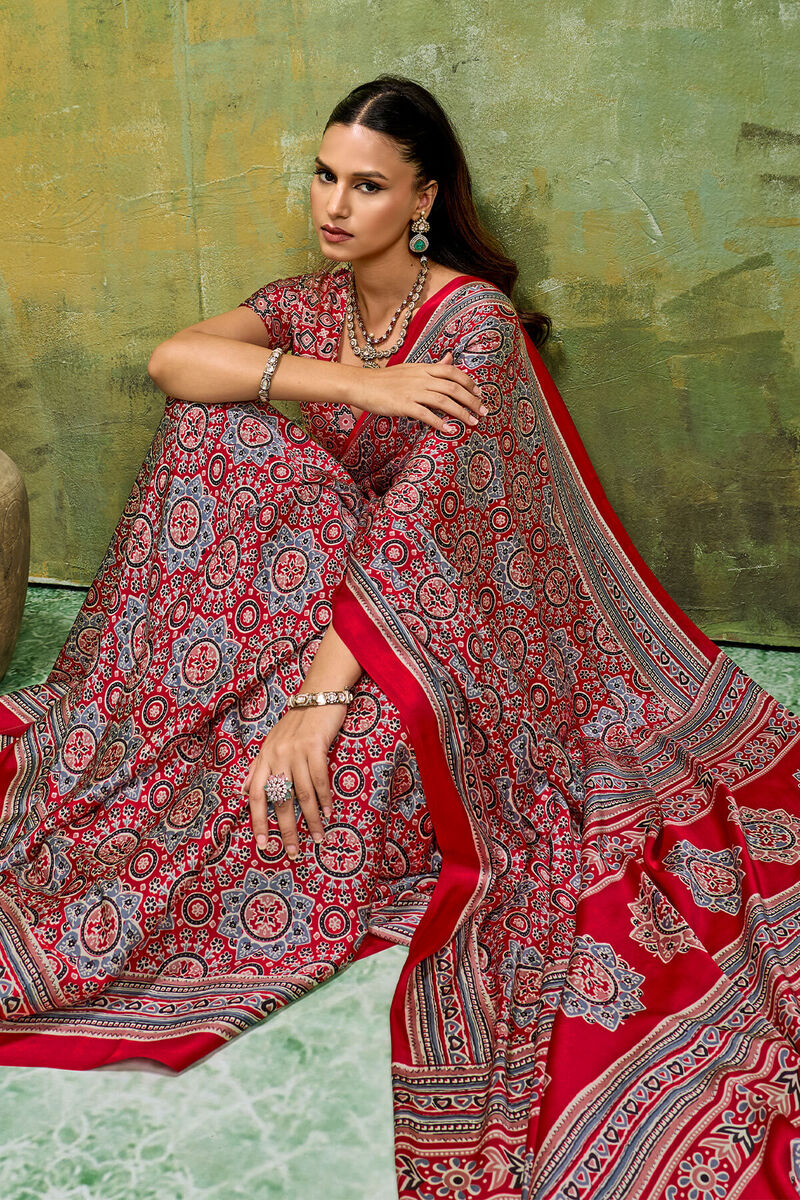 Staggering Red Ajrakh Printed Satin Silk Saree With Splendorous Blouse Piece
