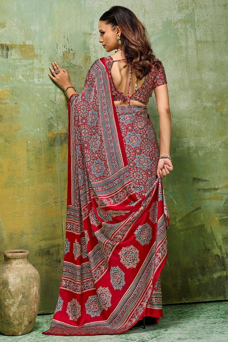 Staggering Red Ajrakh Printed Satin Silk Saree With Splendorous Blouse Piece