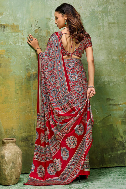 Staggering Red Ajrakh Printed Satin Silk Saree With Splendorous Blouse Piece