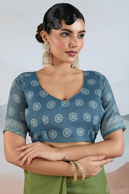 Elaborate Green Cotton Silk Saree With Flameboyant Blouse Piece