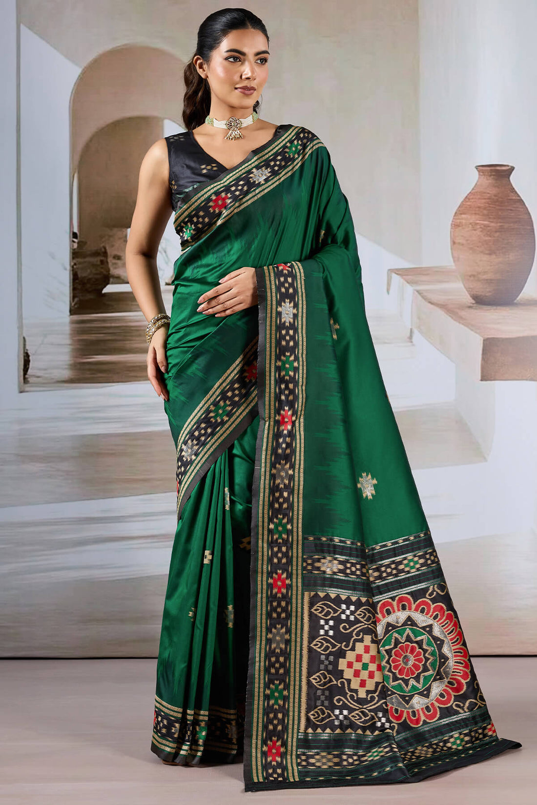 Seraphic Dark Green Patola Silk Saree with Extraordinary Blouse Piece