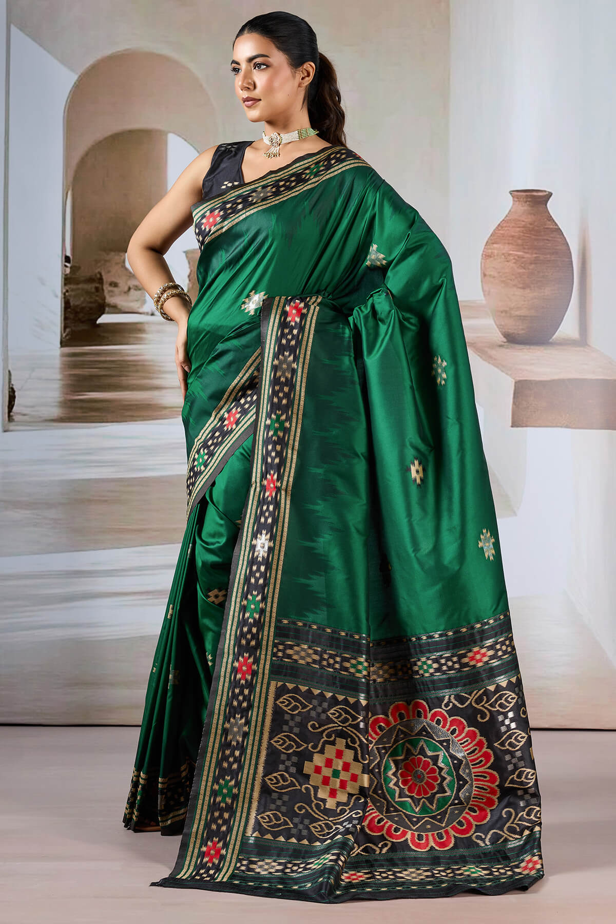 Seraphic Dark Green Patola Silk Saree with Extraordinary Blouse Piece