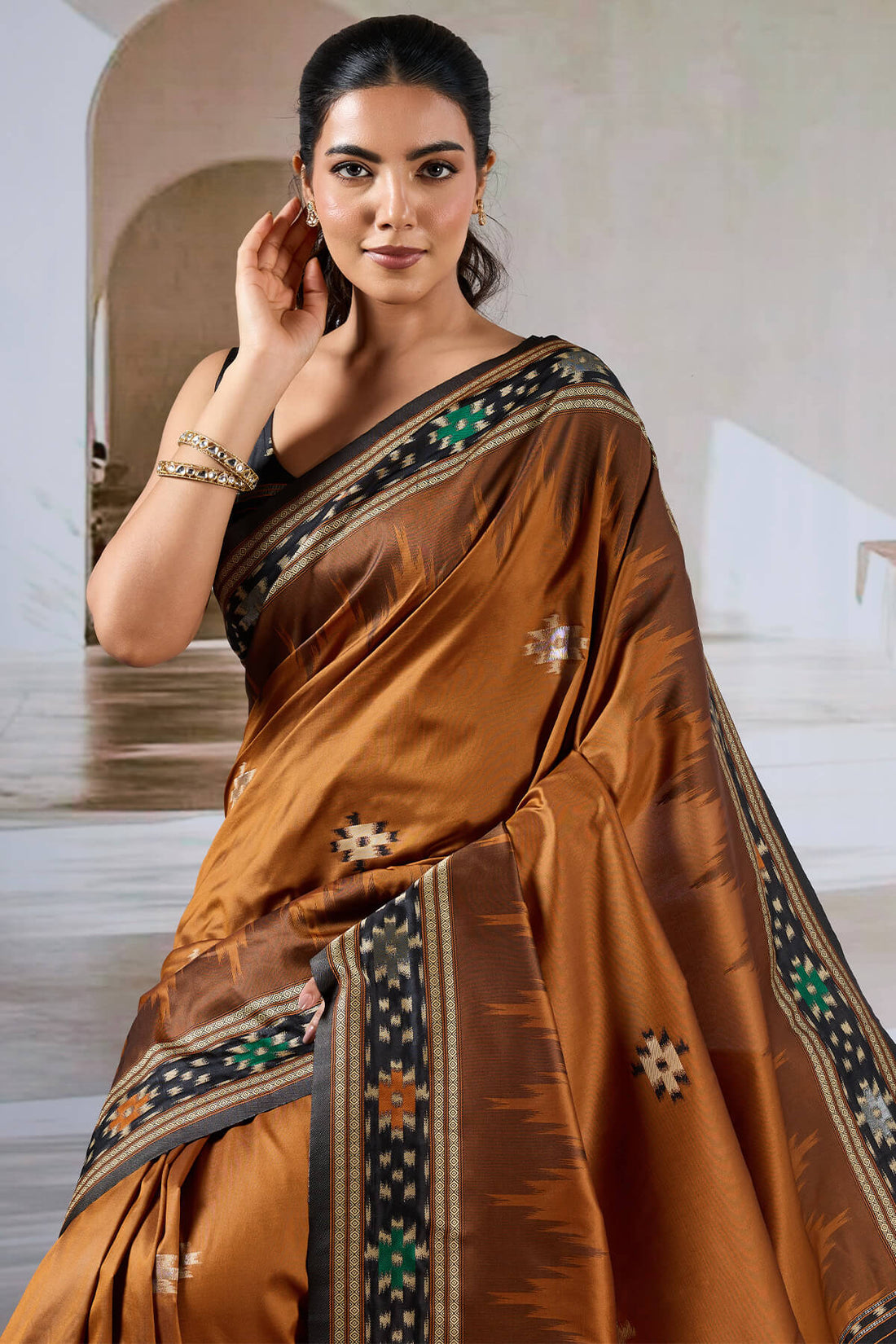Vivacious Brown Patola Silk Saree with Excellent Blouse Piece