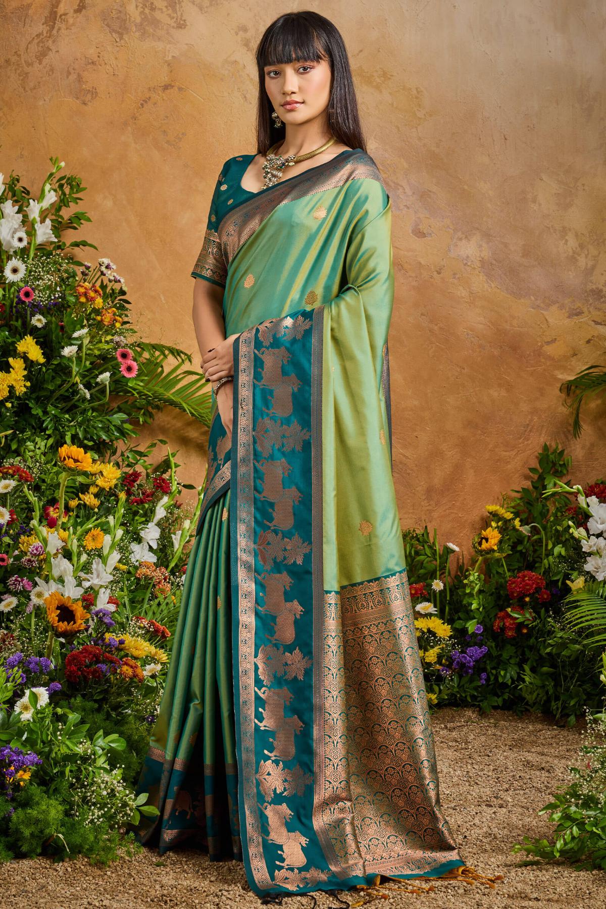 Fugacious Green Soft Banarasi Silk Saree With Unique Blouse Piece