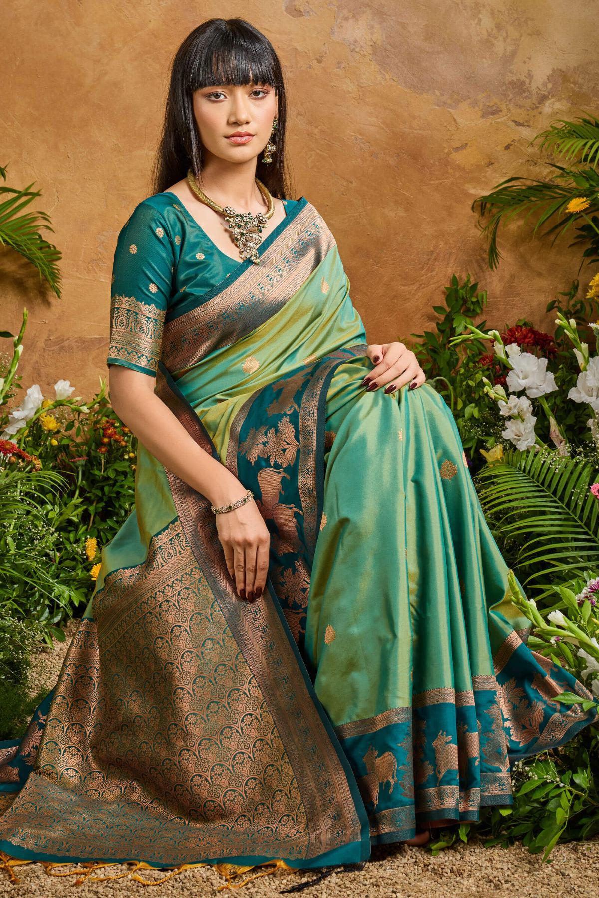 Fugacious Green Soft Banarasi Silk Saree With Unique Blouse Piece