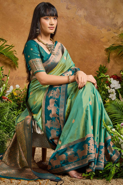 Fugacious Green Soft Banarasi Silk Saree With Unique Blouse Piece