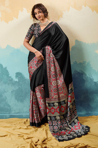 Elision Black Ajrakh Printed Semi Modal Silk Saree With Charismatic Blouse Piece