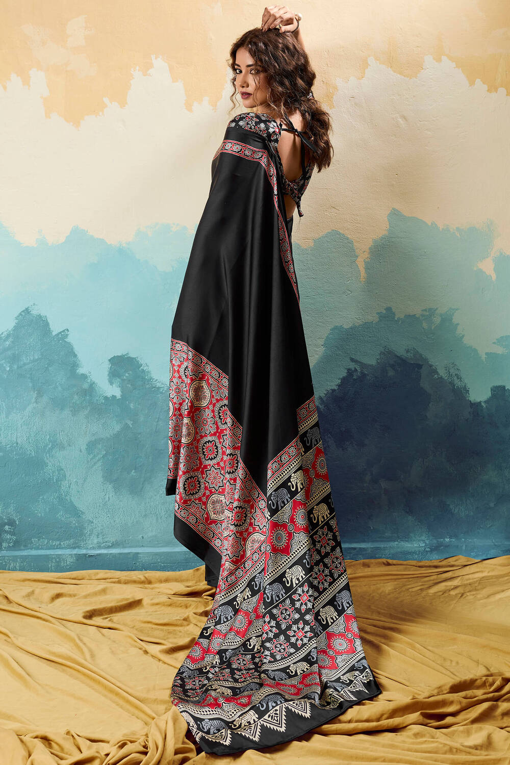 Elision Black Ajrakh Printed Semi Modal Silk Saree With Charismatic Blouse Piece