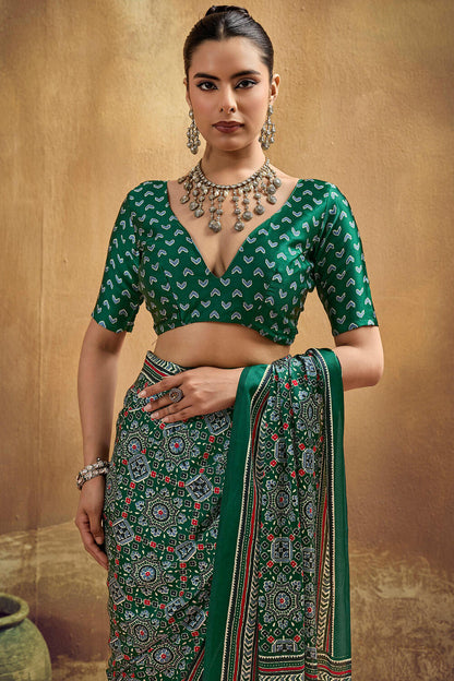 Smashing Dark Green Ajrakh Printed Semi Modal Silk Saree With Opulent Blouse Piece