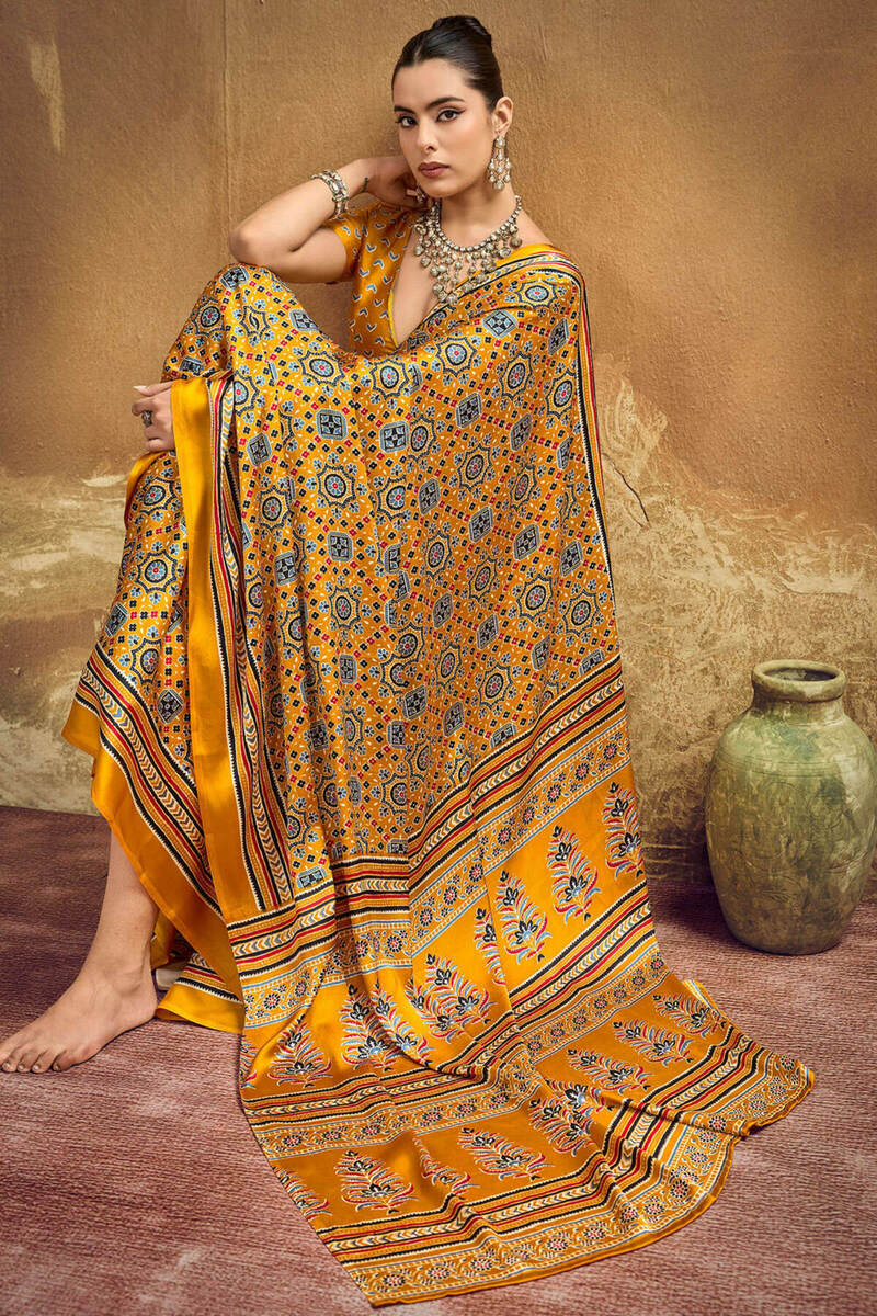 Scintillating Mustard Ajrakh Printed Semi Modal Silk Saree With Arresting Blouse Piece