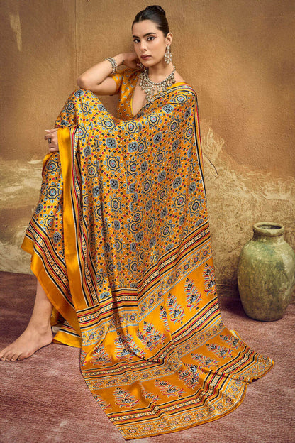 Scintillating Mustard Ajrakh Printed Semi Modal Silk Saree With Arresting Blouse Piece