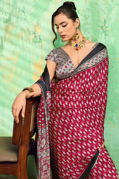 Diaphanous Maroon Ajrakh Printed Semi Modal Silk Saree With Moiety Blouse Piece