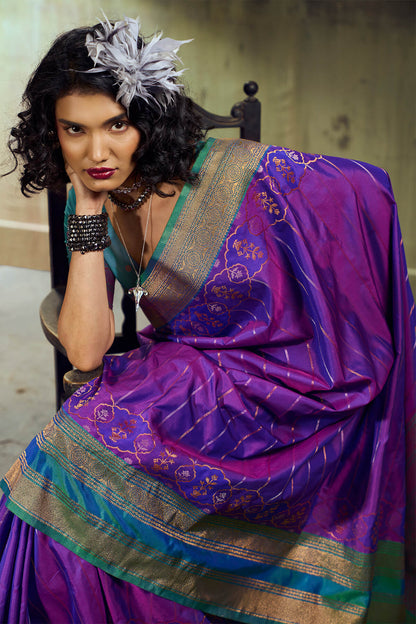 Gleaming Purple Pure Zari Weaving Banarasi Silk Saree With Assemblage Blouse Piece