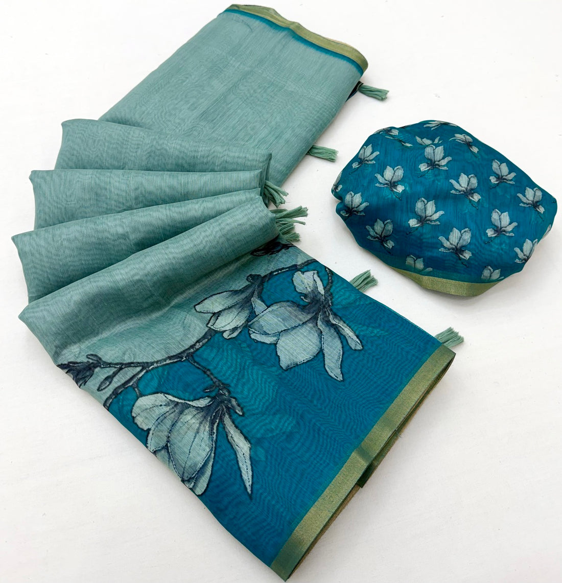 Enchanting Sea Green Printed Cotton Silk Saree With Felicitous Blouse Piece