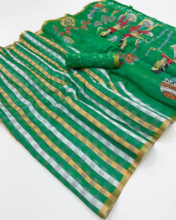 Intricate Dark Green Printed Cotton Silk Saree With Ethereal Blouse Piece