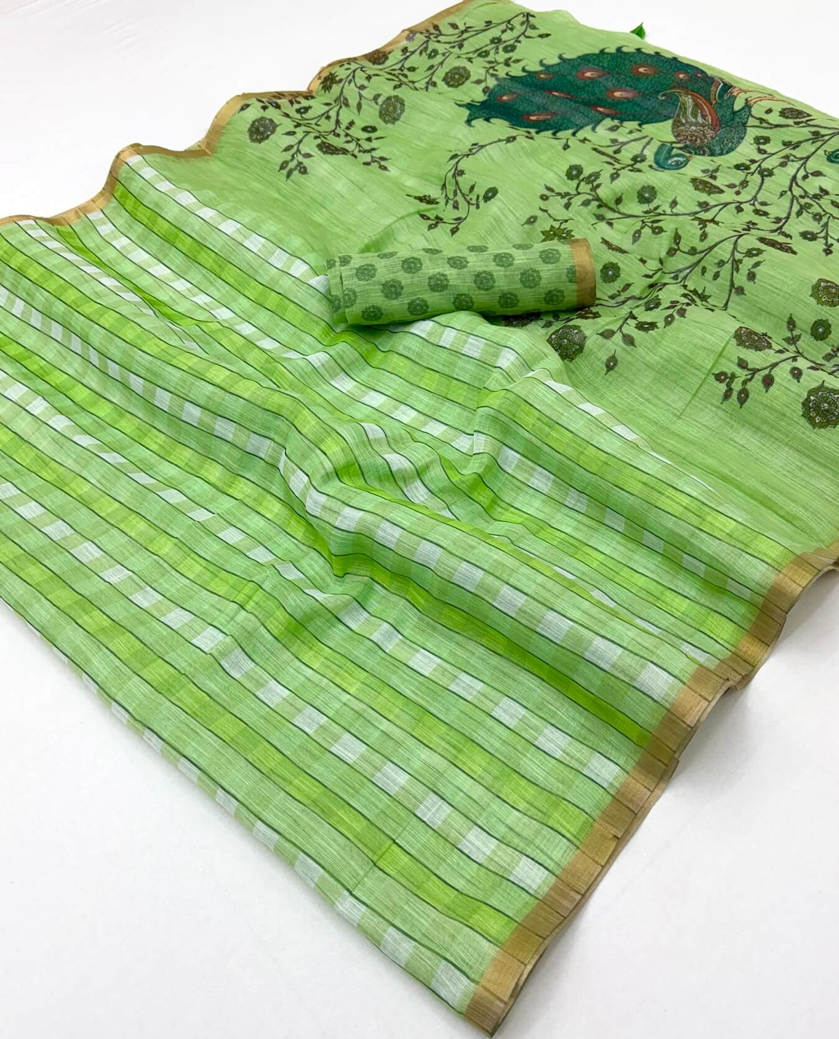 Rhapsody Green Printed Cotton Silk Saree With Entrancing Blouse Piece