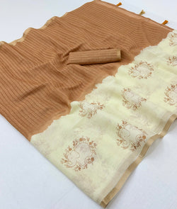 Adorable Beige And Brown Printed Cotton Silk Saree With Stunning Blouse Piece