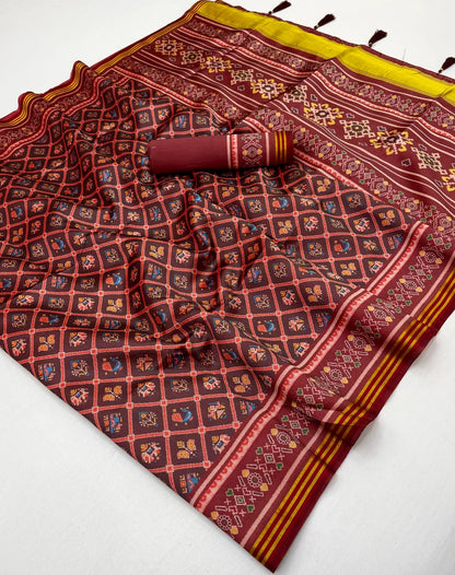 Jazzy Wine Printed Patola Handloom Silk Saree With Pulsating Blouse Piece