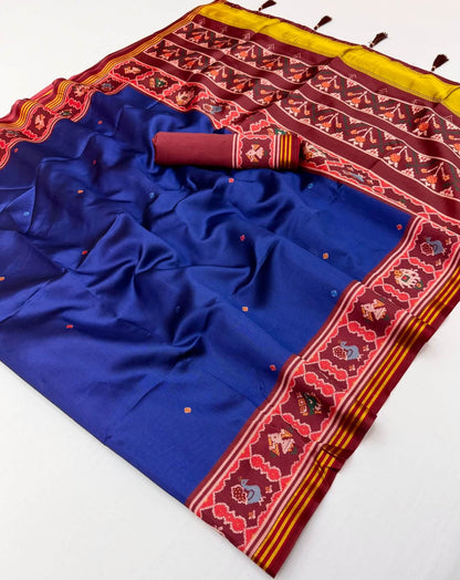 Vestigial Royal Blue Printed Patola Handloom Silk Saree With Angelic Blouse Piece