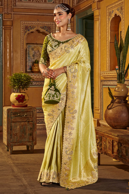 Elaborate Yellow Pure Viscose Hand Embroidery Work Saree With Stitched Blouse