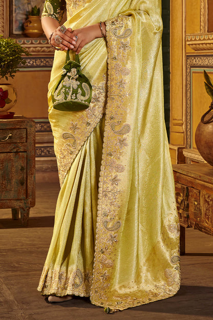 Elaborate Yellow Pure Viscose Hand Embroidery Work Saree With Stitched Blouse