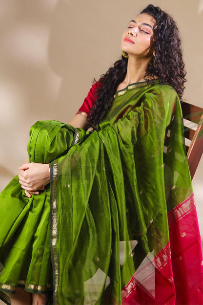 Opulent Green Cotton Silk Saree With Demanding Blouse Piece