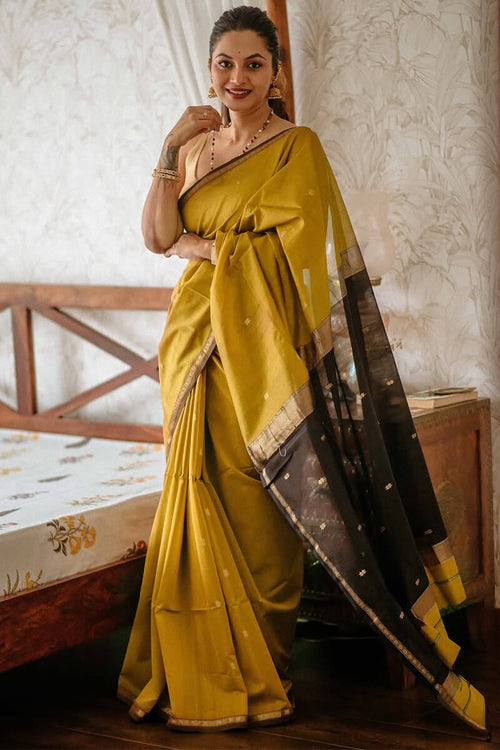 Load image into Gallery viewer, Gleaming Mustard Cotton Silk Saree With Classy Blouse Piece
