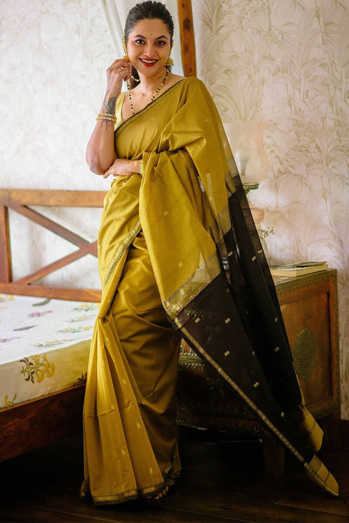 Load image into Gallery viewer, Gleaming Mustard Cotton Silk Saree With Classy Blouse Piece
