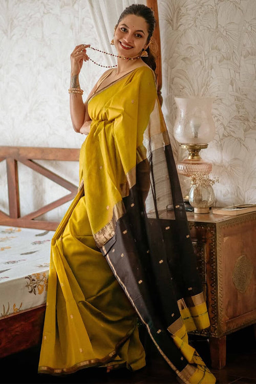 Load image into Gallery viewer, Gleaming Mustard Cotton Silk Saree With Classy Blouse Piece
