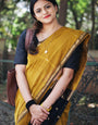 Ethnic Mustard Cotton Silk Saree With Glorious Blouse Piece